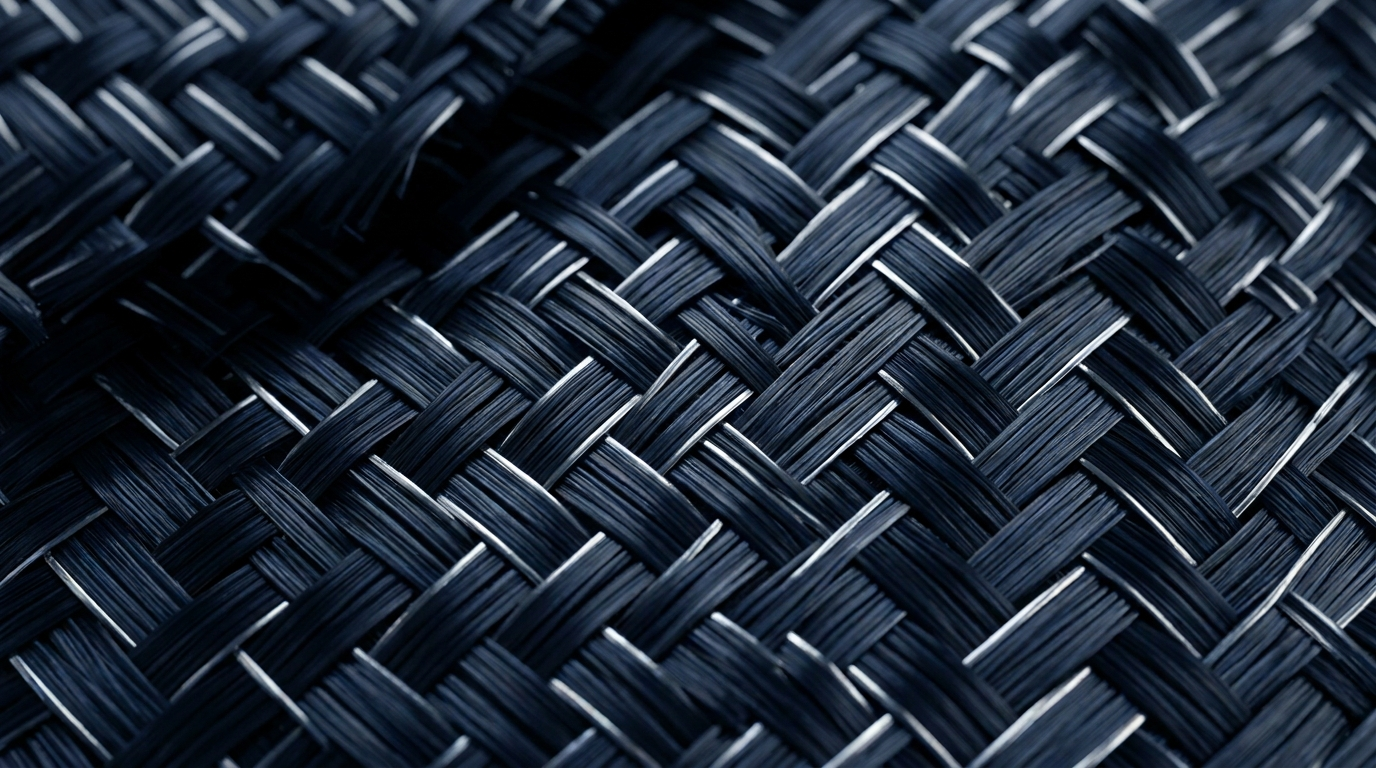 An extreme close up of a high tech textile weave made of carbon fiber